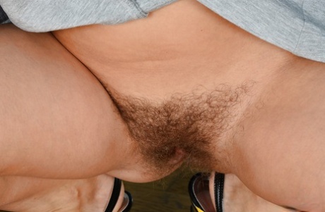 Leggy mom Regina showing her hairy up skirt vagina in high heels