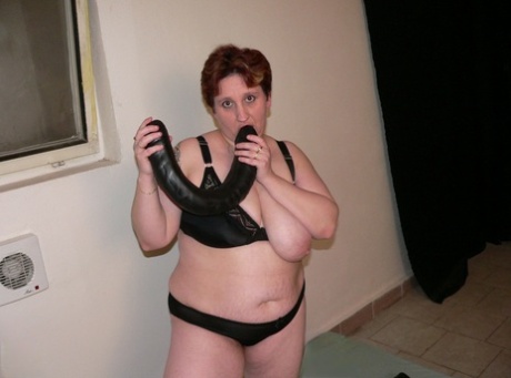 Fat nympho Kurina reveals her curves before sucking & fucking a monster toy