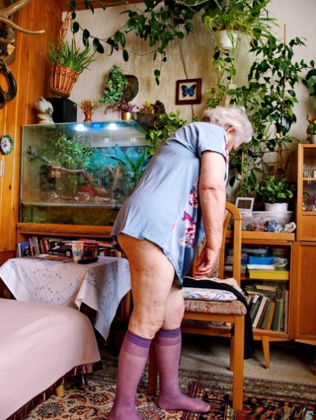 Fat old granny Galfira undresses and poses naked in a solo show