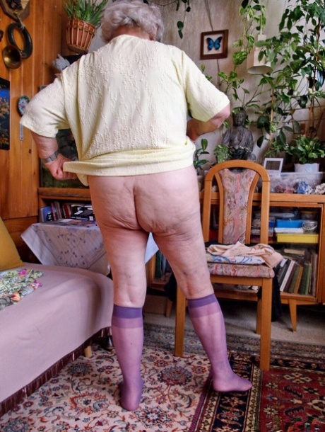Fat old granny Galfira undresses and poses naked in a solo show